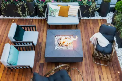 Timber deck with built-in firepit and outdoor lounge setting